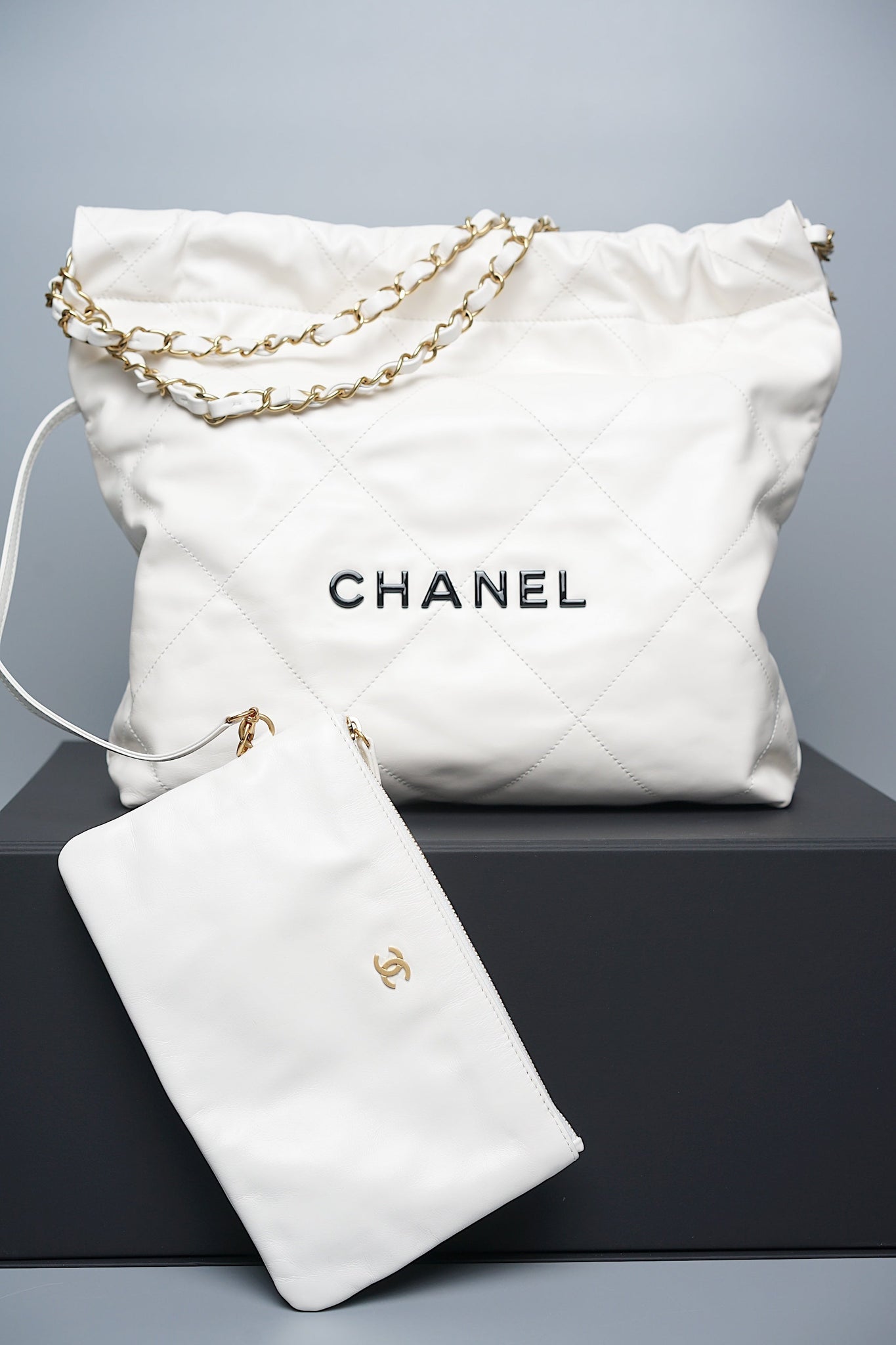 Chanel 22 in White Calfskin with Black Enamel Ghw