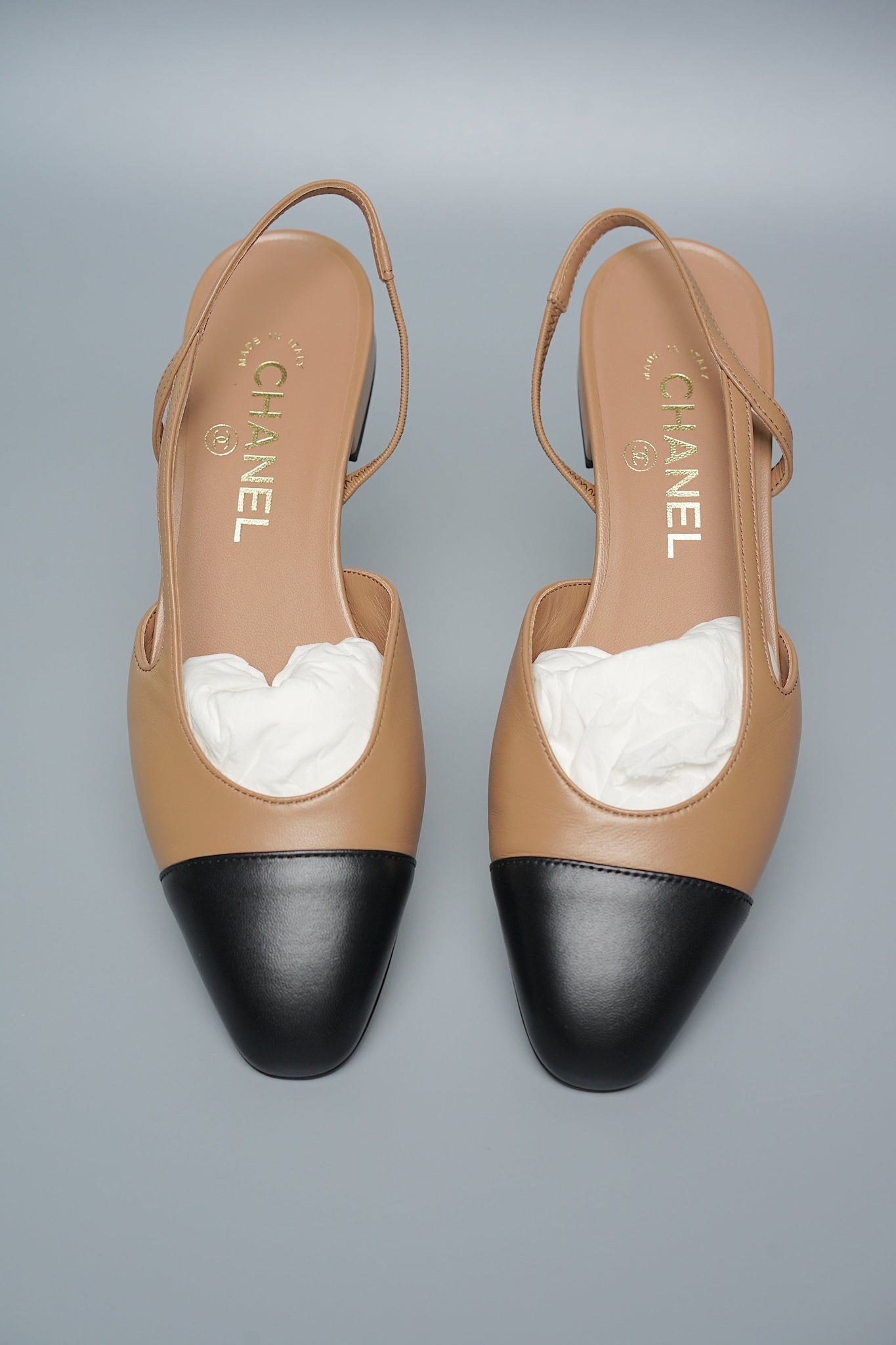 Chanel cream and black shoes on sale