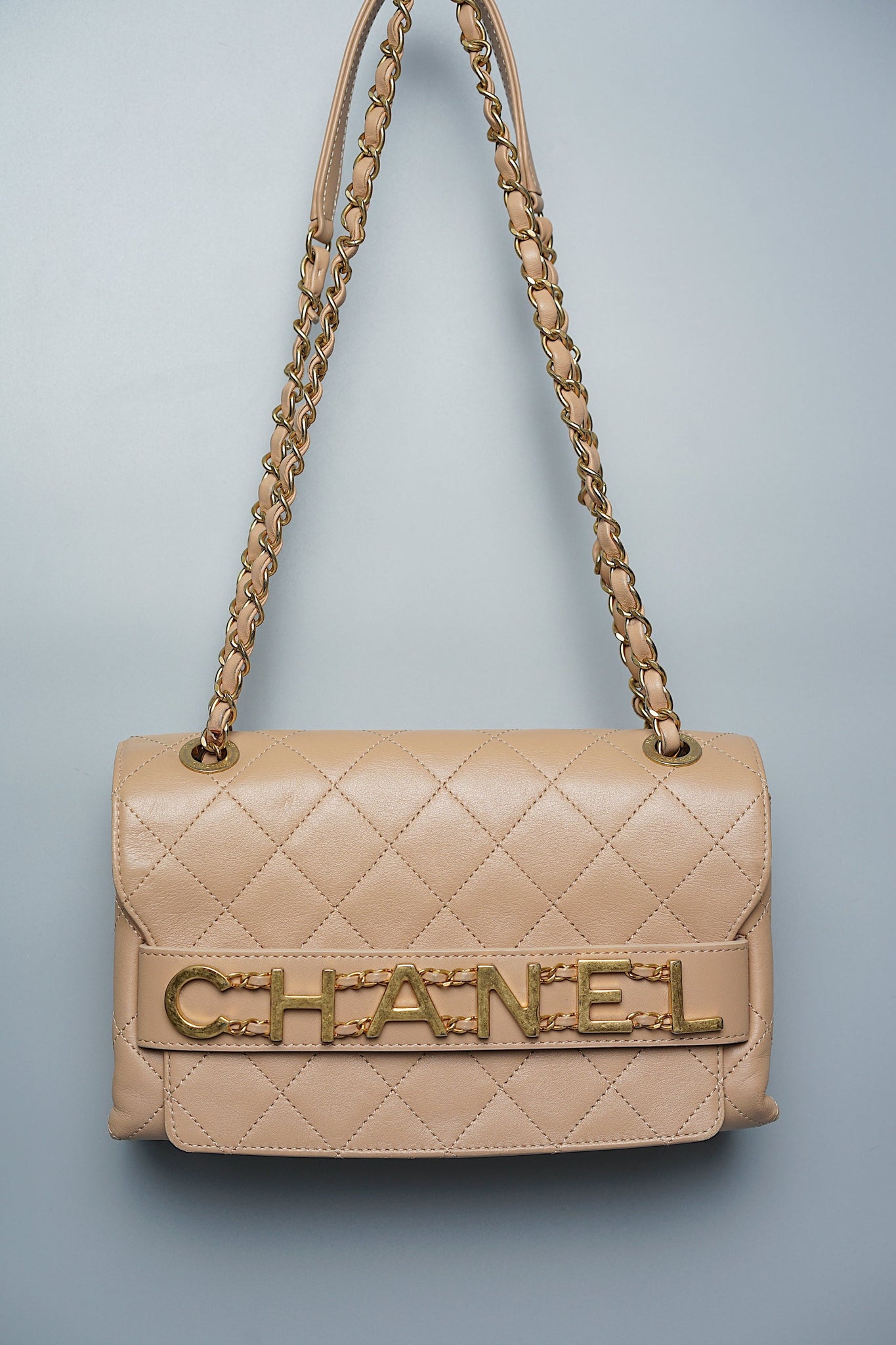 Chanel Logo Quilted Flap in Dark Beige Ghw