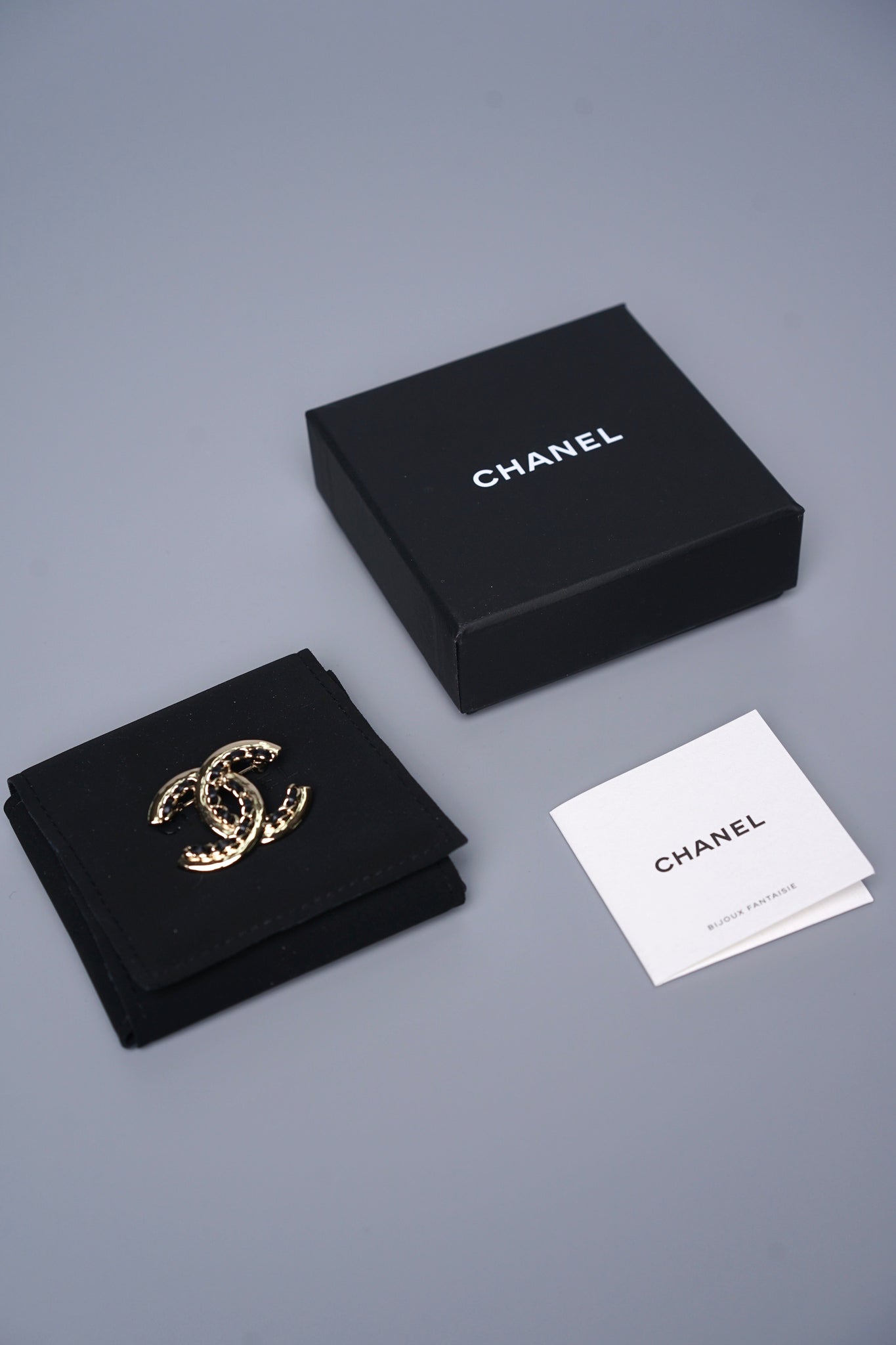 Chanel CC Logo Brooch Pin in Champagne Black