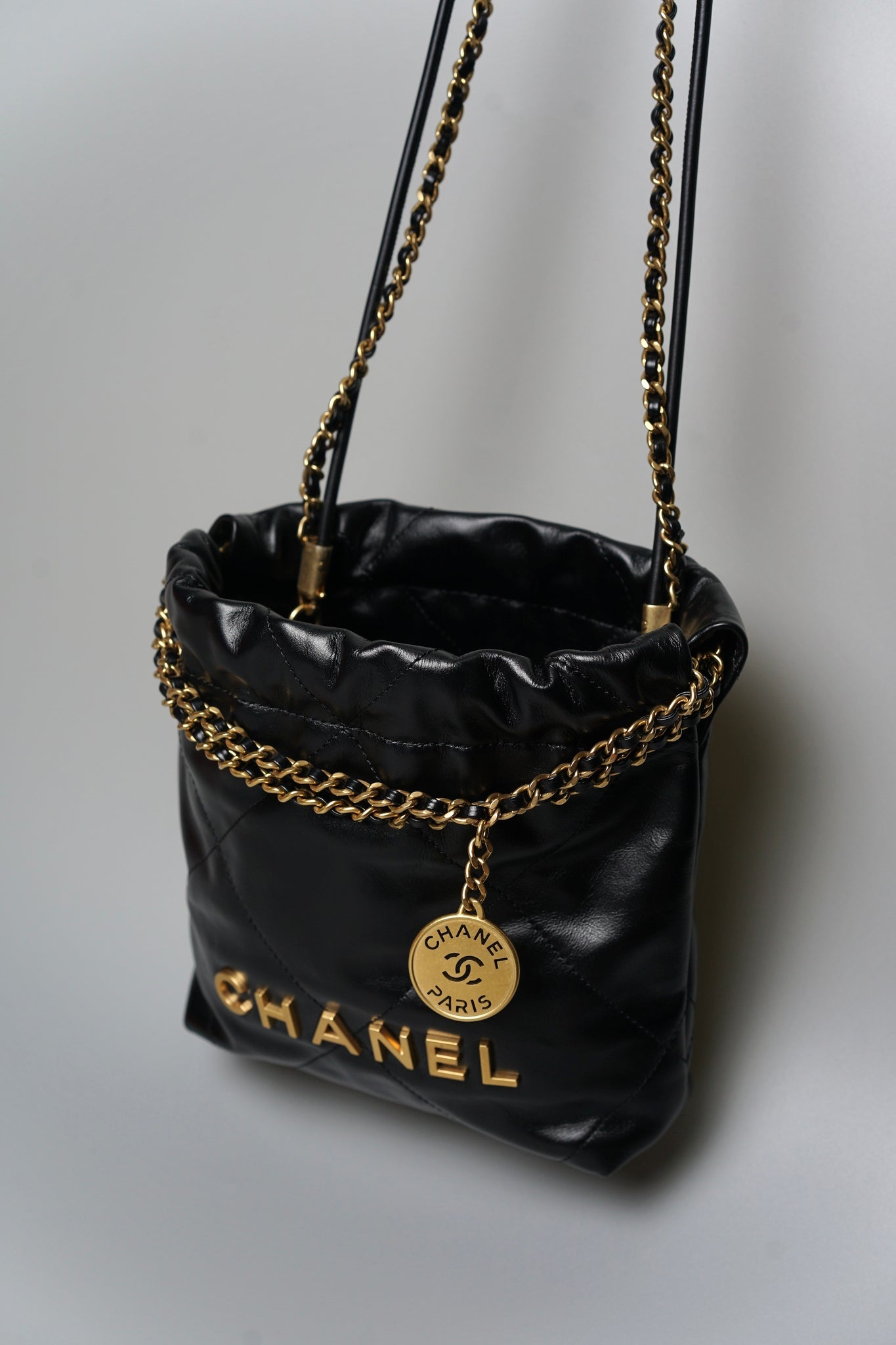 Chanel 22 Mini Hobo Bag in Black Bghw