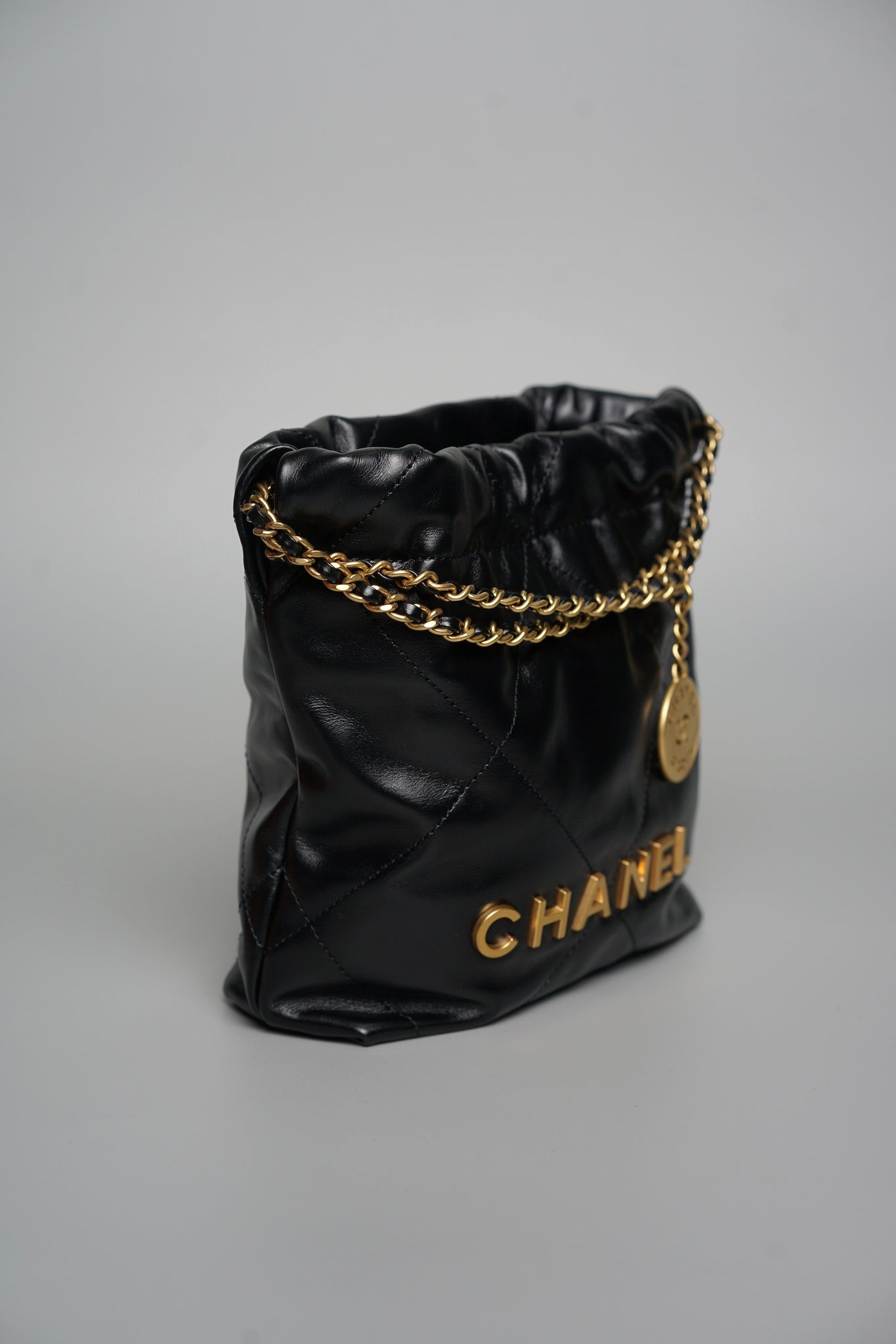 Chanel 22 Mini Hobo Bag in Black Bghw
