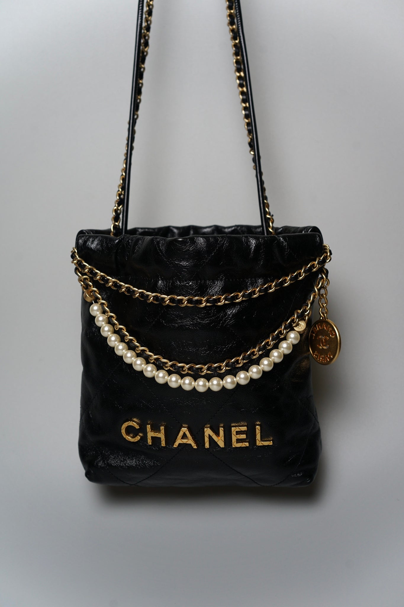 Chanel 22 Mini with Pearl in Black Shiny Crumpled Calfskin Ghw