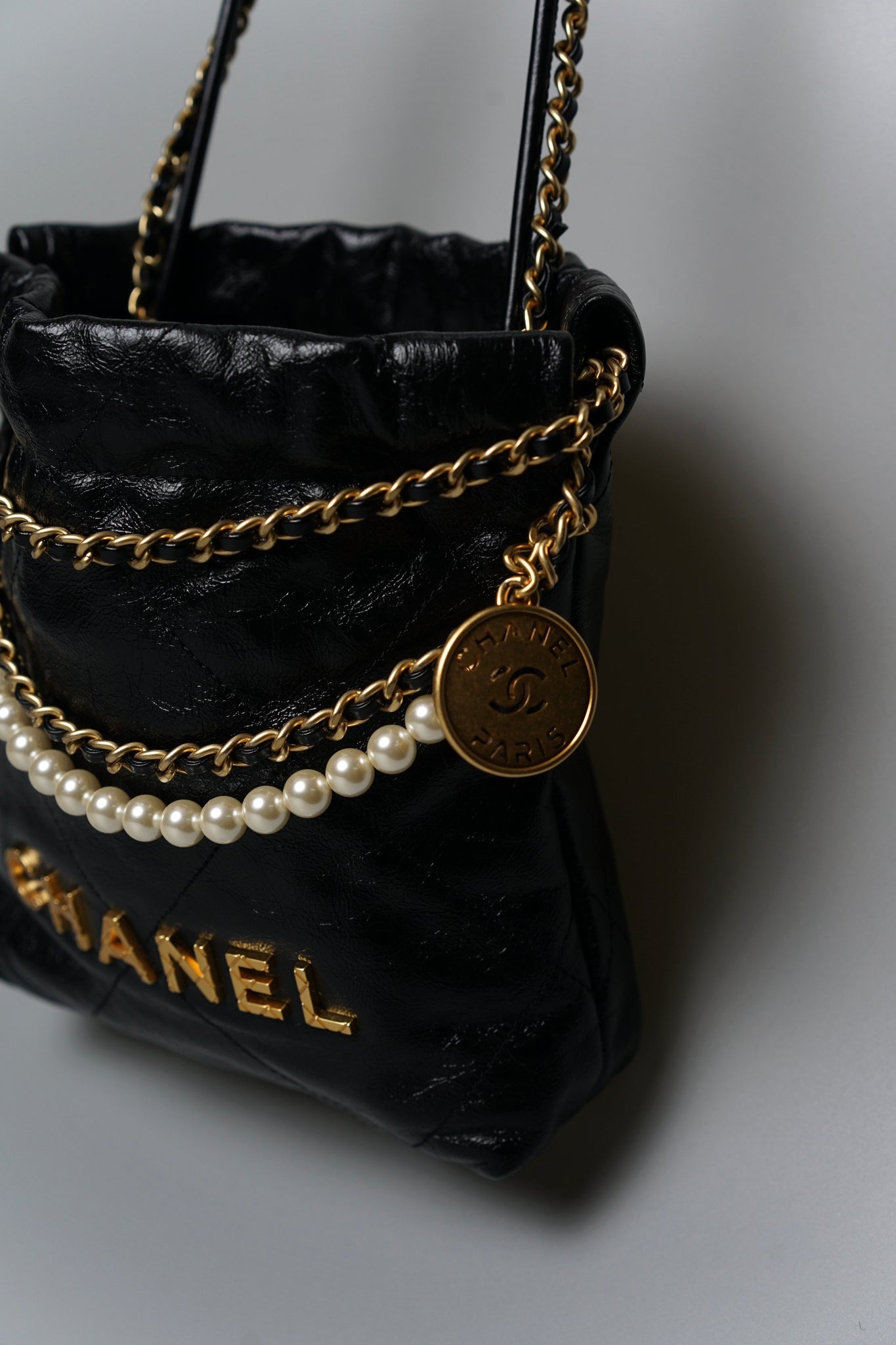 Chanel 22 Mini with Pearl in Black Shiny Crumpled Calfskin Ghw