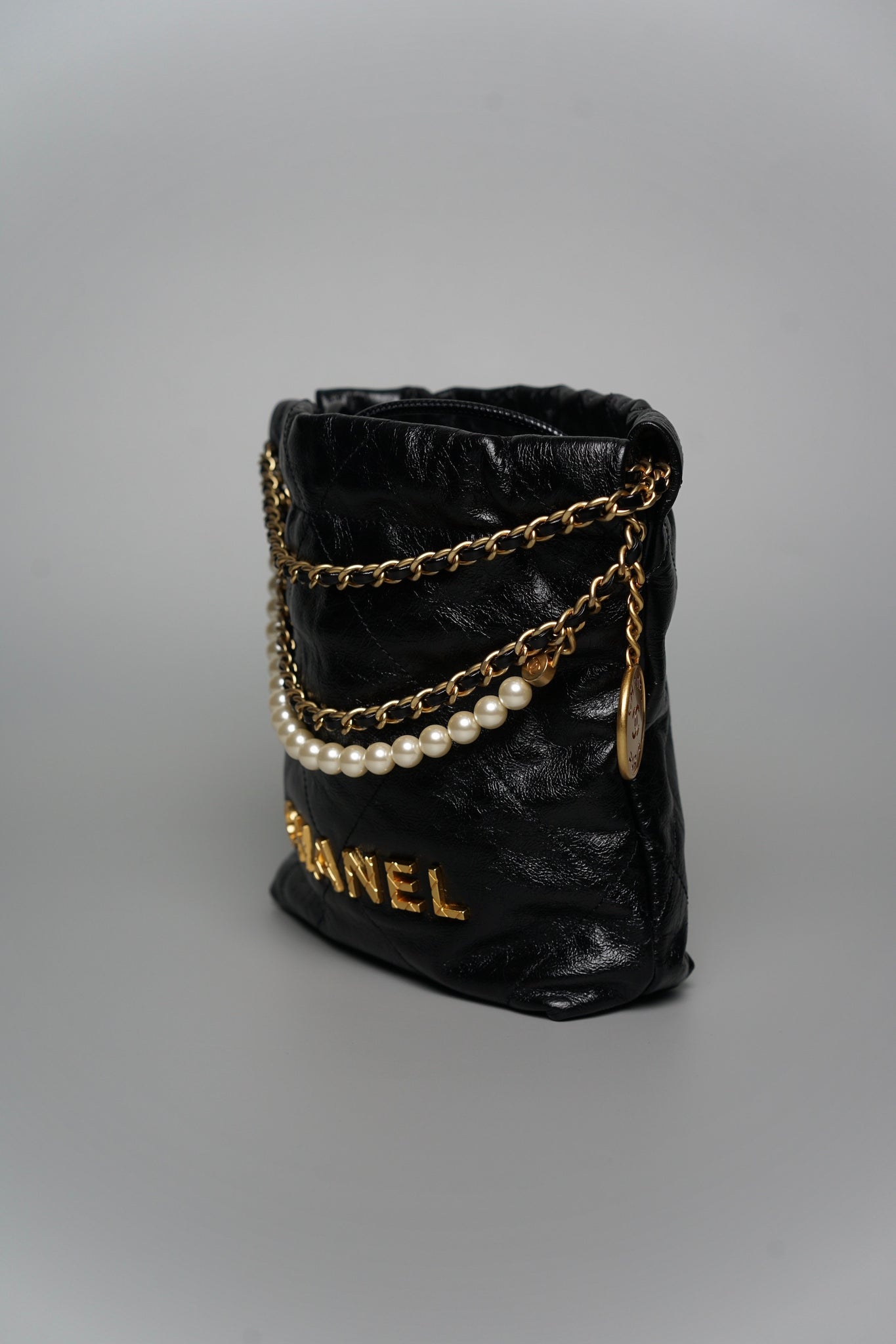 Chanel 22 Mini with Pearl in Black Shiny Crumpled Calfskin Ghw